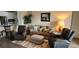 Inviting living room featuring comfortable seating, neutral tones, and stylish decor at 3998 Bedford Ave, Winter Haven, FL 33884