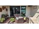 Outdoor patio featuring comfortable furniture, plants, and scenic backyard views at 3998 Bedford Ave, Winter Haven, FL 33884