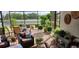 Relaxing screened patio with comfortable seating and scenic water views at 3998 Bedford Ave, Winter Haven, FL 33884