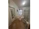 Bright bathroom with an enclosed shower, separate soaking tub, and a neutrally painted walls at 4012 King Edward Dr, Orlando, FL 32826