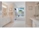 Open bathroom with soaking tub and dual vanities with ample counter space at 4119 Pecan Ln, Orlando, FL 32812