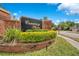 Elegant community sign for Conway Place, set against a backdrop of lush landscaping and clear skies at 4119 Pecan Ln, Orlando, FL 32812