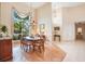 Formal dining area showcases large window, tile and wood flooring, and decorative chandelier at 4119 Pecan Ln, Orlando, FL 32812