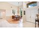 Elegant dining room with high ceilings, tile and wood floors, chandelier, and abundant natural light at 4119 Pecan Ln, Orlando, FL 32812