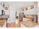 Bright kitchen featuring granite countertops, white cabinets, and stainless steel appliances at 4119 Pecan Ln, Orlando, FL 32812