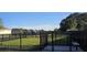 Fenced dog park with benches and green space for community residents to enjoy at 451 Shadow Gorge Way, Eustis, FL 32736