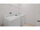 Neat laundry room featuring new washer and dryer at 451 Shadow Gorge Way, Eustis, FL 32736