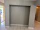 This empty room has ceramic tile flooring and is ready to be customized at 4617 Frisco Cir, Orlando, FL 32808