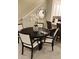 Dining area featuring a round table with seating for six at 4762 Sparkling Shell Ave, Kissimmee, FL 34746