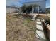 Large backyard with patio area and garden at 5006 Vellacito Way, Davenport, FL 33897