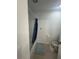 Standard bathroom with tub and shower and blue patterned shower curtain at 5006 Vellacito Way, Davenport, FL 33897