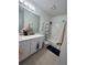 Bright bathroom with tub and shower at 5006 Vellacito Way, Davenport, FL 33897