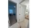 Bathroom and bedroom through doorways at 5006 Vellacito Way, Davenport, FL 33897