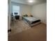 Carpeted bedroom with desk and single bed at 5006 Vellacito Way, Davenport, FL 33897