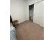 Bedroom with carpet and walk-in closet at 5006 Vellacito Way, Davenport, FL 33897
