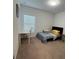 Bedroom with carpet, large window, and desk at 5006 Vellacito Way, Davenport, FL 33897