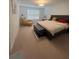Bedroom with sitting area, large bed, and decor at 5006 Vellacito Way, Davenport, FL 33897