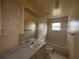 Modest bathroom with tub, shower, and vanity at 6042 Wade St, Leesburg, FL 34748