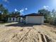 Charming single-story home featuring a modern exterior and an attached two-car garage at 6168 Sw 154Th St, Ocala, FL 34473