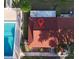 Aerial view showcasing roof, pool, and backyard at 68 S Marbrisa Way, Kissimmee, FL 34743