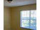 Bedroom with a big window at 697 Winding Lake Dr, Clermont, FL 34711