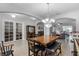 This spacious dining room features tile floors and an open floor plan at 721 Lake Cove Pointe Cir, Winter Garden, FL 34787