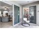 Covered lanai with sliding glass doors leading to the living room and main bedroom at 721 Lake Cove Pointe Cir, Winter Garden, FL 34787