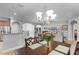 Open living space with dining area, kitchen, living room, and lots of natural light at 721 Lake Cove Pointe Cir, Winter Garden, FL 34787