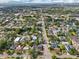 Overhead neighborhood shot featuring tranquil streets, beautiful homes, and mature landscaping at 730 W Swoope Ave, Winter Park, FL 32789