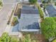 A high-angle shot of the home's layout, including the fenced backyard, surrounding trees, and street access at 730 W Swoope Ave, Winter Park, FL 32789