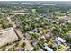 Aerial view of the neighborhood showcasing the mix of housing and nearby green spaces at 730 W Swoope Ave, Winter Park, FL 32789