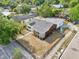 An aerial view of the home showing the roof, landscaping, and its position within the neighborhood at 730 W Swoope Ave, Winter Park, FL 32789