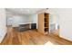 Modern kitchen with hardwood floors, gray cabinets, wood divider and new, stainless steel appliances at 730 W Swoope Ave, Winter Park, FL 32789