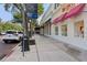 Street view with stylish stores, a tree-lined sidewalk, benches, and ample parking for convenient shopping at 730 W Swoope Ave, Winter Park, FL 32789