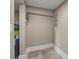 Utility room with tile flooring and neutral paint at 821 E Lemon Ave, Eustis, FL 32726