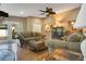 Comfortable living room with hardwood floors, neutral walls, and glass doors to the backyard at 8316 Granada Blvd, Orlando, FL 32836