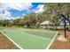 Community park featuring a basketball court, picnic pavilion and lake at 8316 Granada Blvd, Orlando, FL 32836