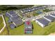 Aerial view of neighborhood amenities, including a playground and basketball court at 901 Ocean Course Ave, Davenport, FL 33896