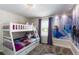 Fun bedroom with bunk beds and Frozen-themed wallpaper at 901 Ocean Course Ave, Davenport, FL 33896
