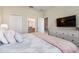 Cozy bedroom with a view to a stylish bathroom at 901 Ocean Course Ave, Davenport, FL 33896