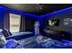 Star Wars themed bedroom featuring blue LED lighting and twin beds at 901 Ocean Course Ave, Davenport, FL 33896