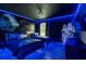 Star Wars themed bedroom featuring blue LED lighting and twin beds at 901 Ocean Course Ave, Davenport, FL 33896