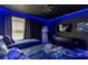 Star Wars themed bedroom featuring blue LED lighting and twin beds at 901 Ocean Course Ave, Davenport, FL 33896