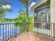 Screened in balcony with tile floor overlooking a beautiful pond at 960 Mooring Ave # 202, Altamonte Springs, FL 32714