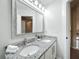 Bathroom featuring double sinks, granite countertops, and modern fixtures at 960 Mooring Ave # 202, Altamonte Springs, FL 32714