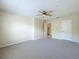 Bedroom featuring a ceiling fan, neutral carpet and paint, and closet at 960 Mooring Ave # 202, Altamonte Springs, FL 32714