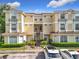 Inviting condo complex with tile roof, landscaping, and convenient parking at 960 Mooring Ave # 202, Altamonte Springs, FL 32714