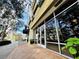 Inviting building entrance with glass doors and windows, providing a view into the interior space at 101 S Eola Dr # 720, Orlando, FL 32801