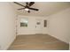 Large bedroom with new floor and a ceiling fan at 1016 E Fillmore Ave, Orlando, FL 32809