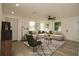 Bright living room featuring lots of natural light, modern furnishings, and neutral color palette at 1016 E Fillmore Ave, Orlando, FL 32809